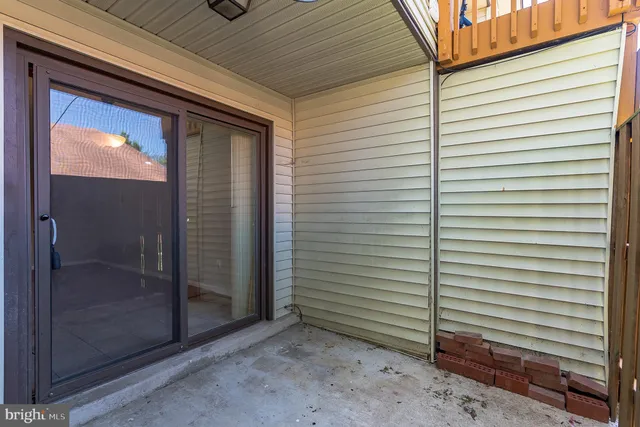 a view of a door and a window