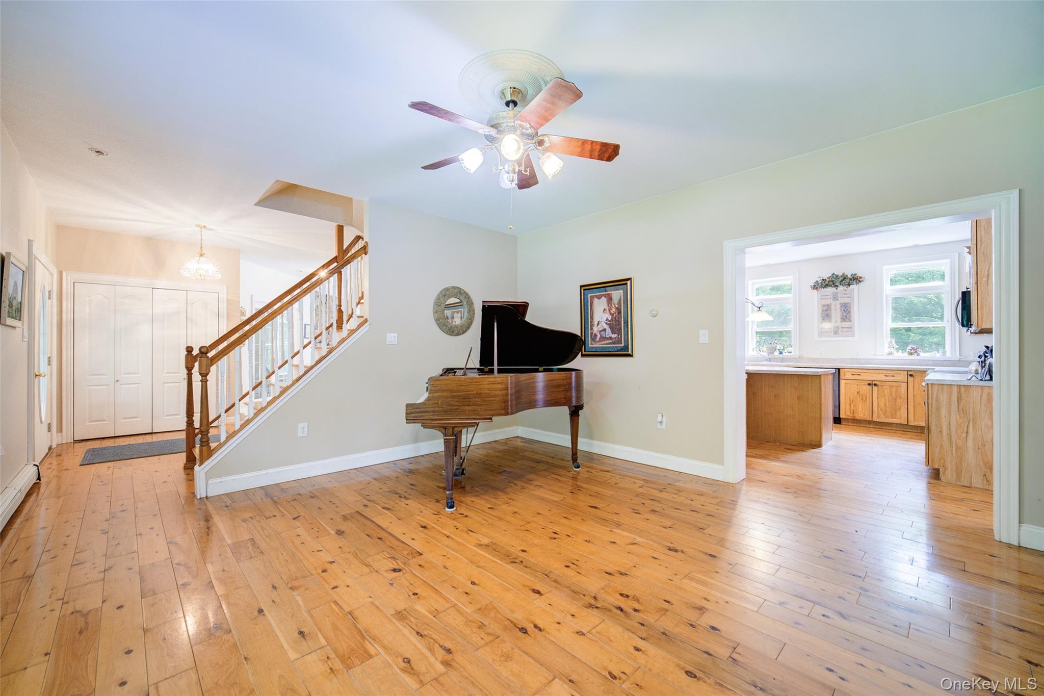 221 Rabbit Run Road Clintondale, NY 12515 - Photo 18 of 50 a view of an empty room wooden floor and a ceiling fan