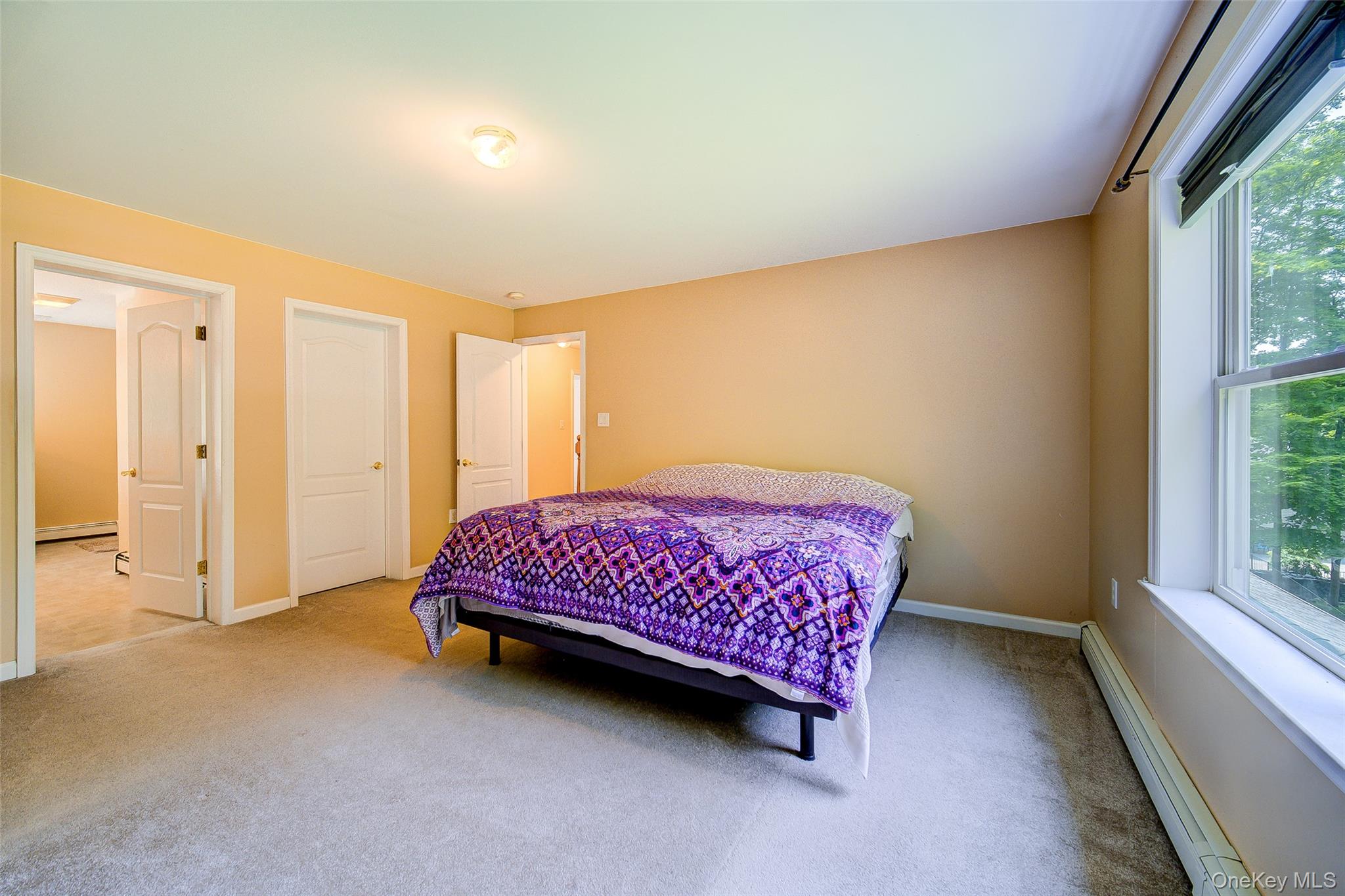 221 Rabbit Run Road Clintondale, NY 12515 - Photo 24 of 50 a bedroom with a bed and a window