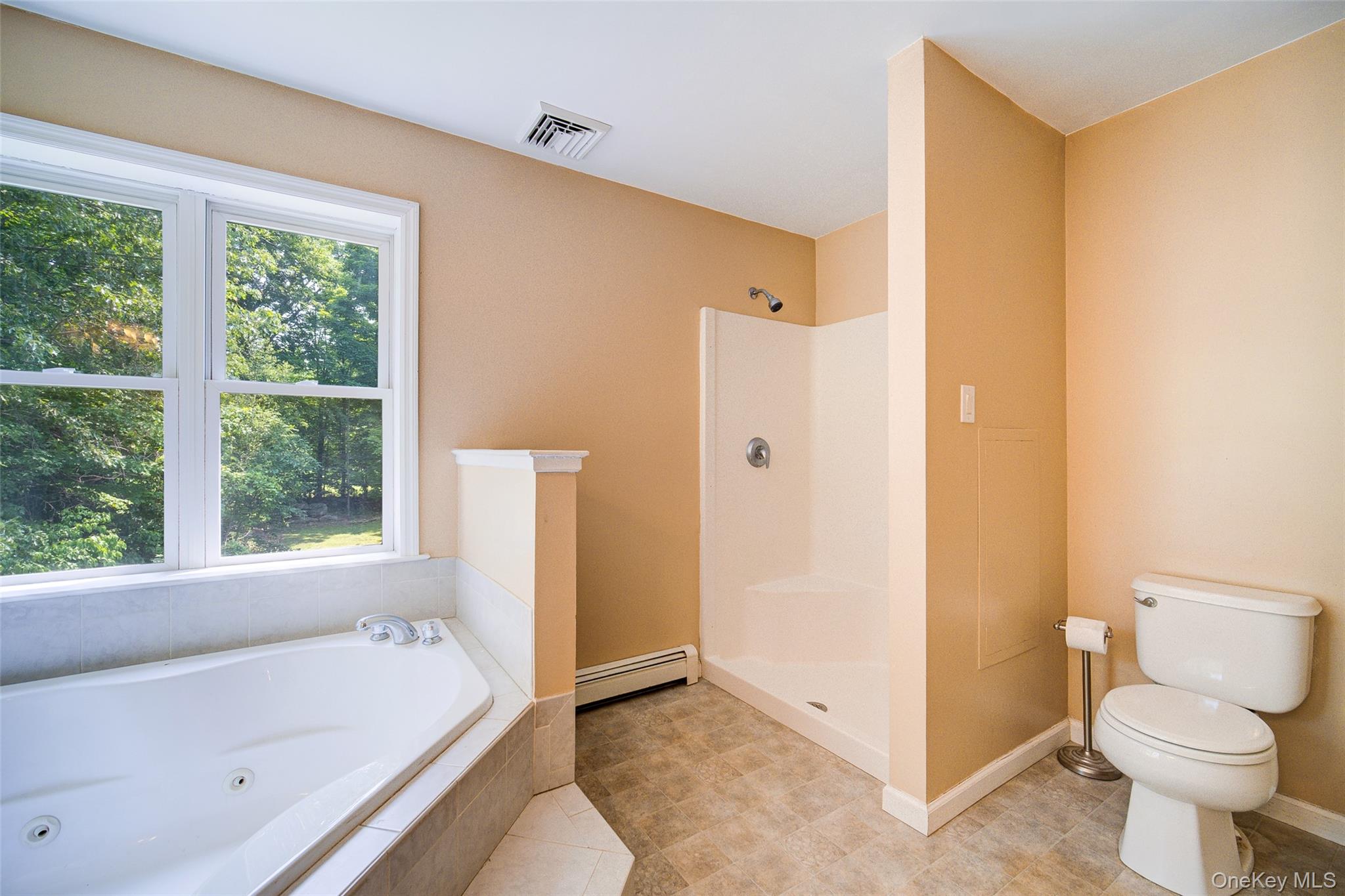 221 Rabbit Run Road Clintondale, NY 12515 - Photo 28 of 50 a bathroom with a tub and a toilet