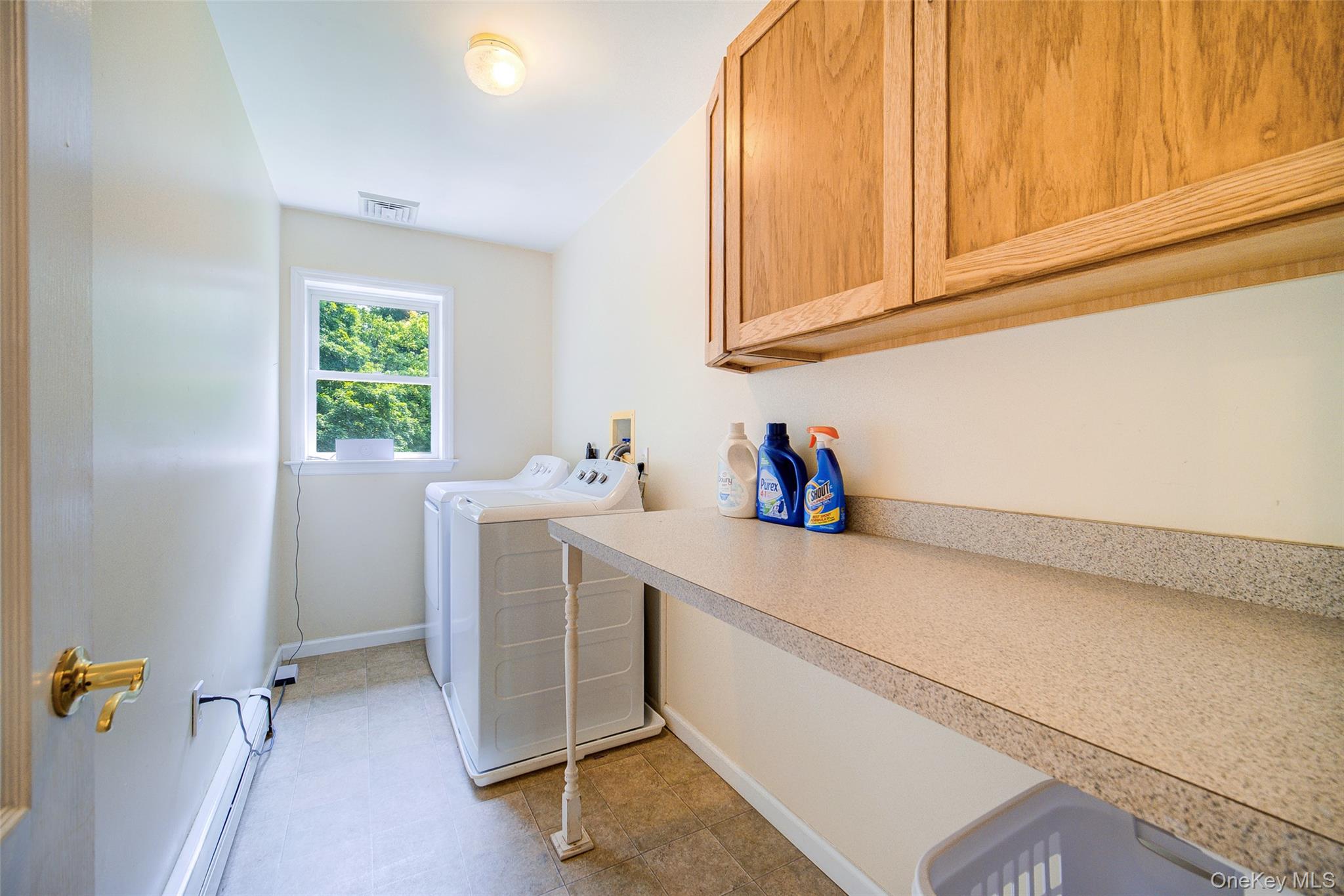 221 Rabbit Run Road Clintondale, NY 12515 - Photo 29 of 50 a room with a cabinets and a window