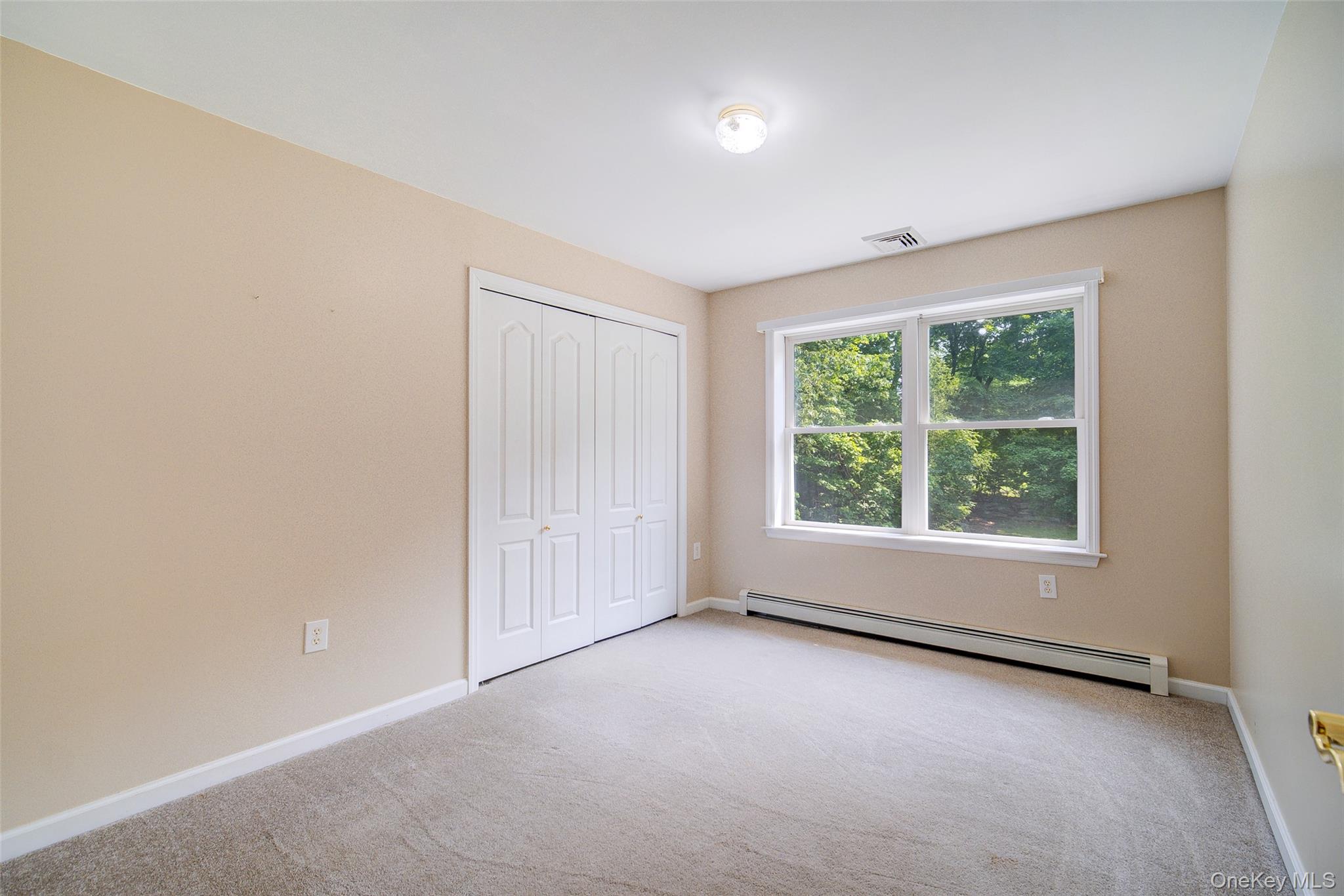 221 Rabbit Run Road Clintondale, NY 12515 - Photo 30 of 50 an empty room with windows