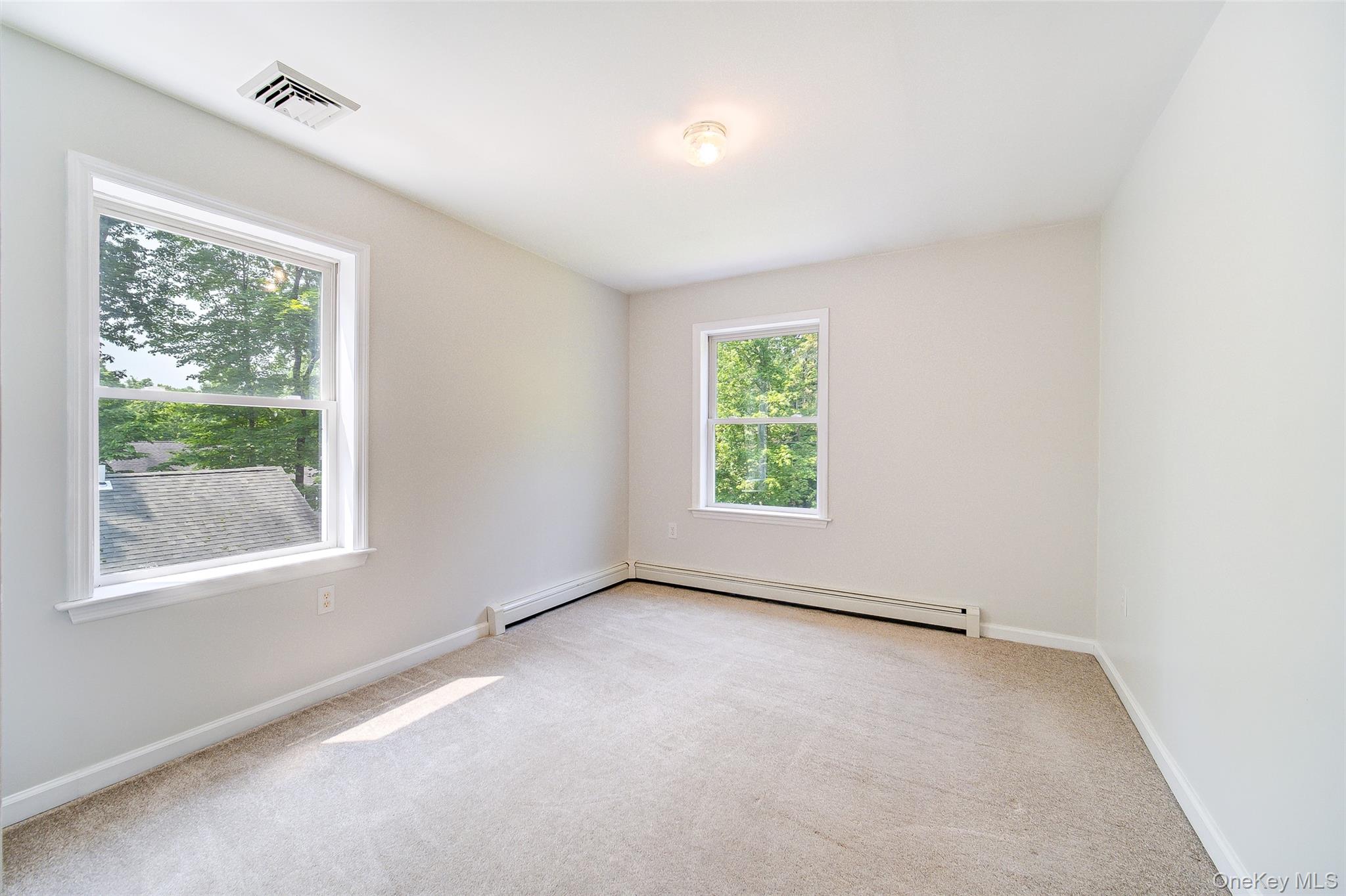 221 Rabbit Run Road Clintondale, NY 12515 - Photo 31 of 50 an empty room with windows