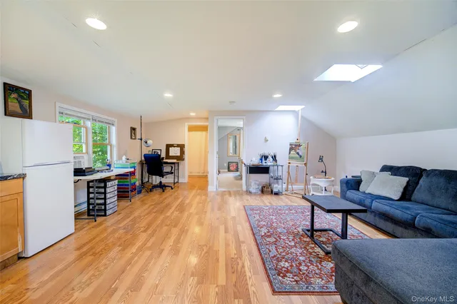 a room with furniture and a window