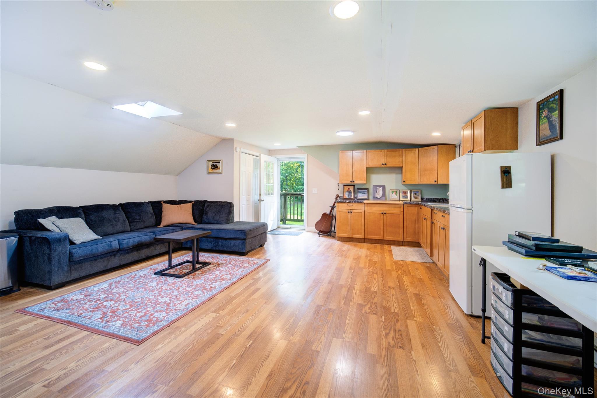 221 Rabbit Run Road Clintondale, NY 12515 - Photo 47 of 50 a living room with furniture and a wooden floor