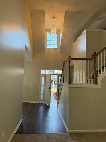a view of entryway with wooden floor