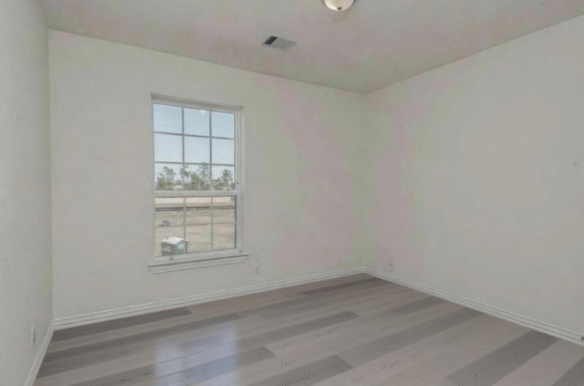 3223 Harmony Creek Lane Spring, TX 77386 - Photo 30 of 34 an empty room with a window