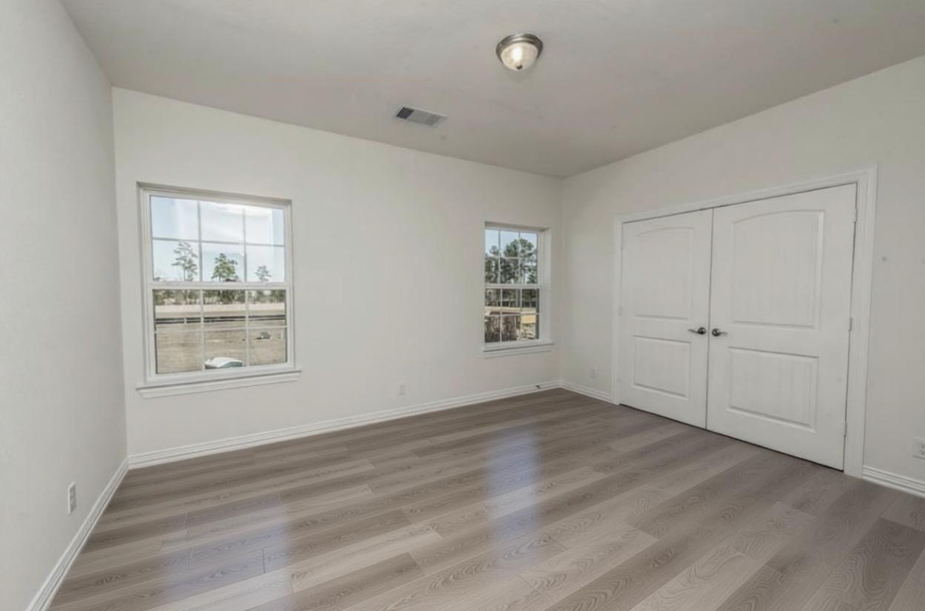 3223 Harmony Creek Lane Spring, TX 77386 - Photo 32 of 34 an empty room with windows