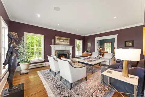 a fireplace with a clock on top of it