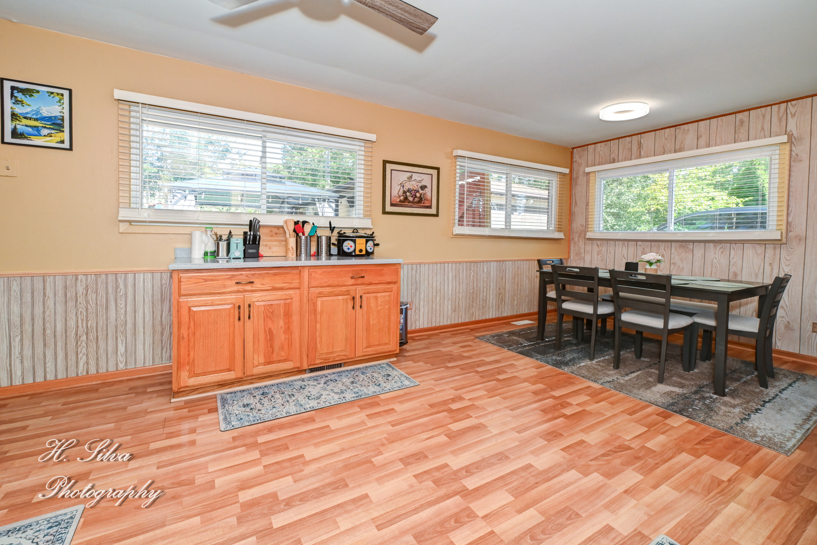 117 Marryat Place Streamwood, IL 60107 - Photo 5 of 15 a living room with furniture a large window and wooden floor