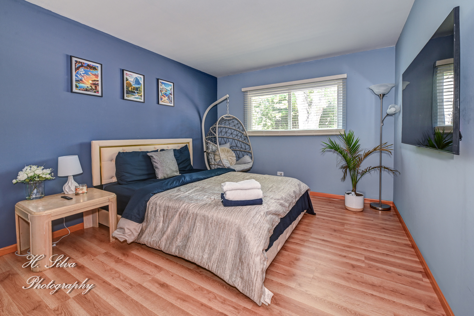 117 Marryat Place Streamwood, IL 60107 - Photo 9 of 15 a bedroom with a bed and wooden floor