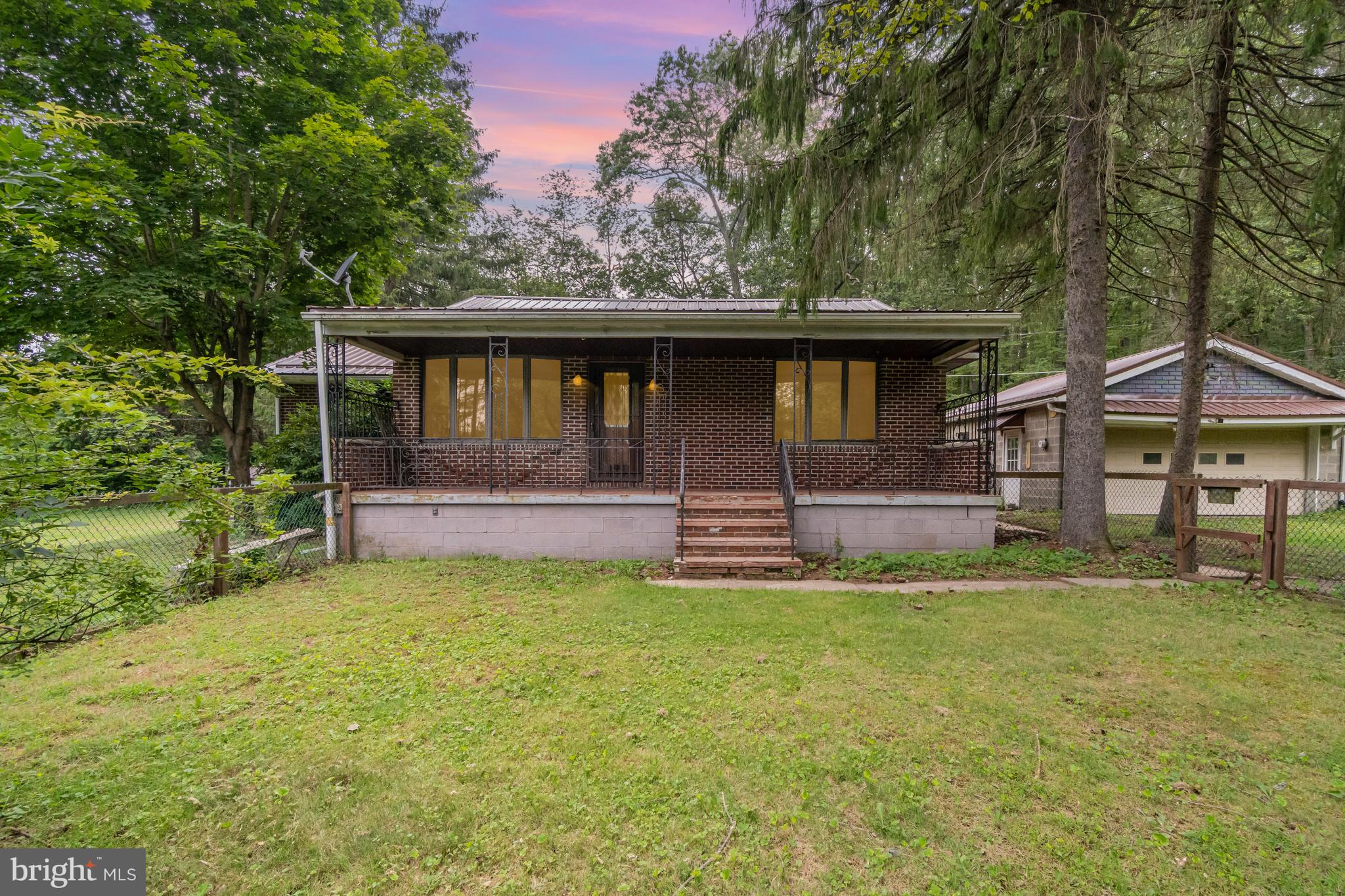 199 State Road Barnesville, PA 18214 - Photo 1 of 56 a view of house with backyard and a garden