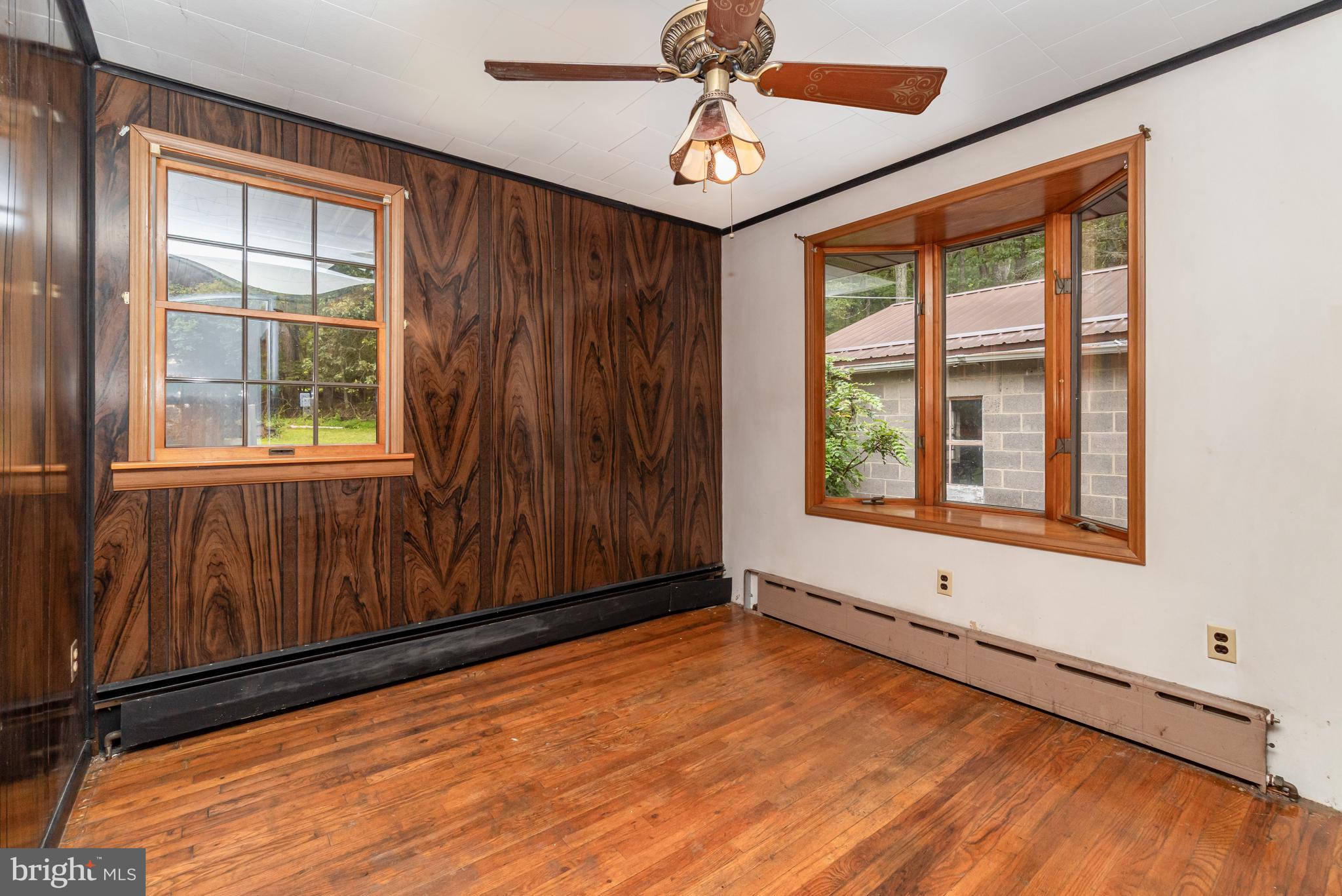 199 State Road Barnesville, PA 18214 - Photo 22 of 56 a view of an empty room with a window and wooden floor