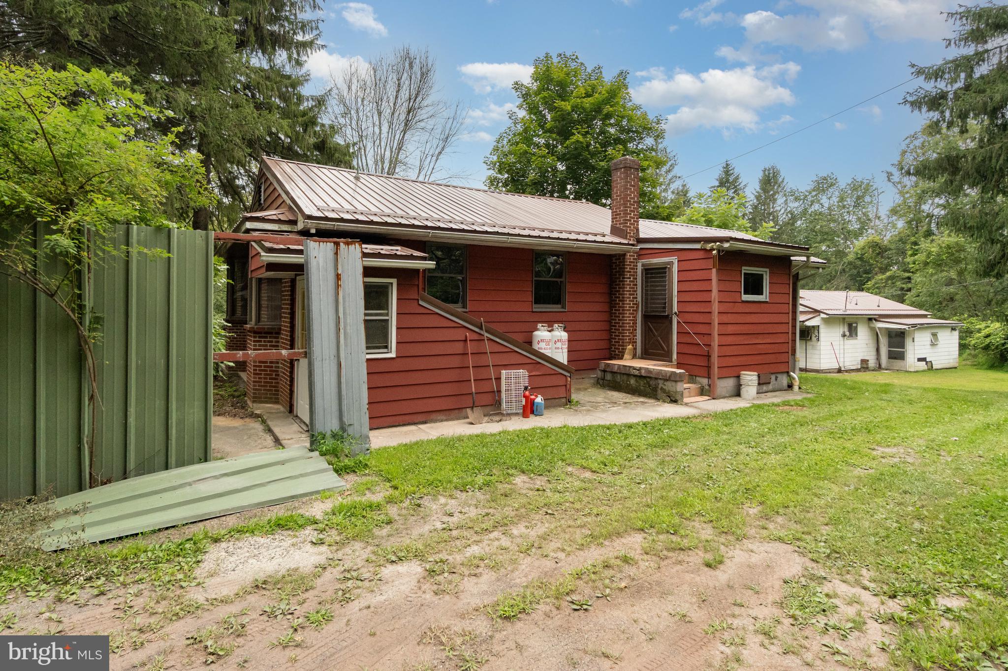 199 State Road Barnesville, PA 18214 - Photo 26 of 56 a view of a house with a backyard