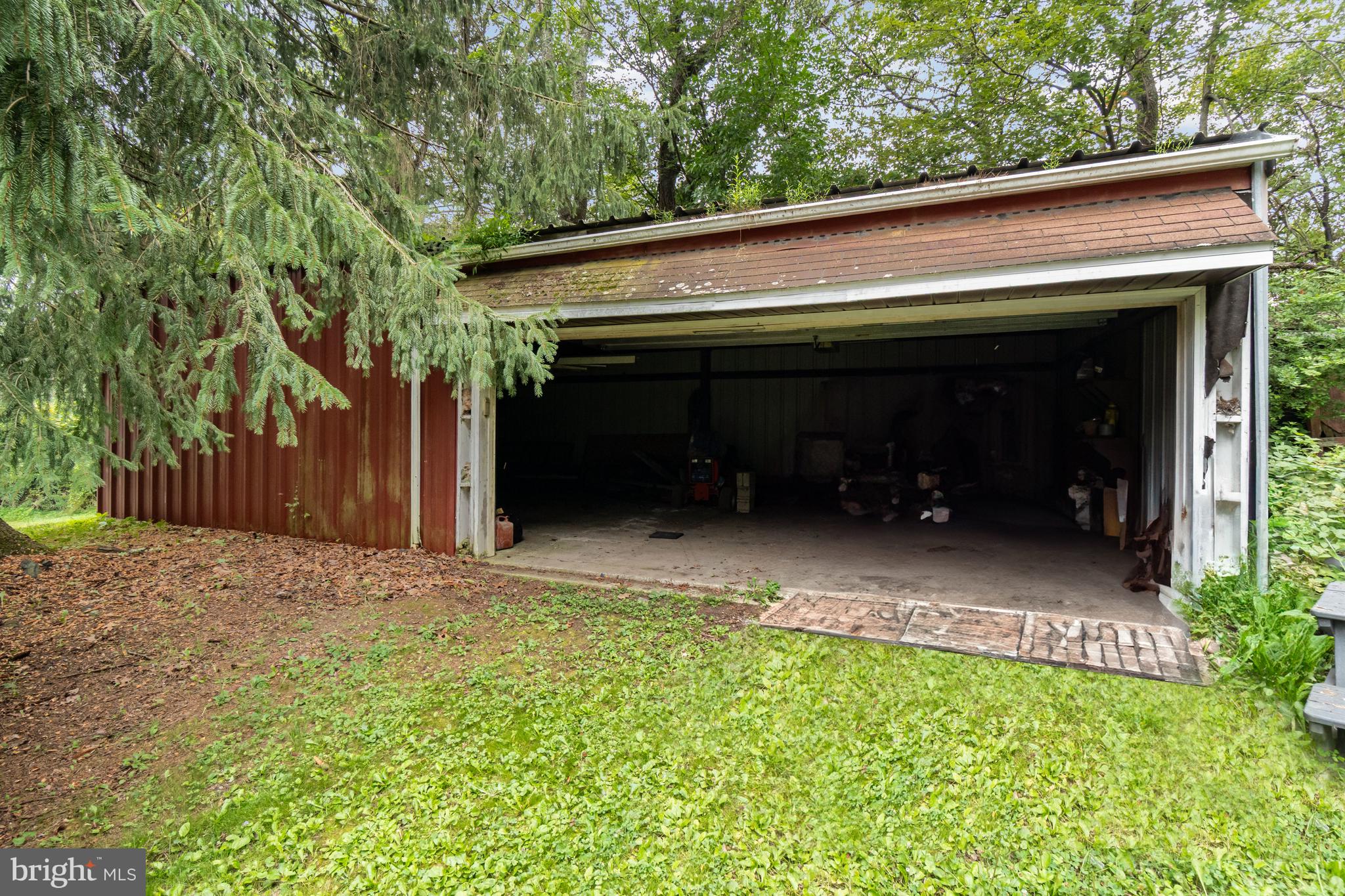 199 State Road Barnesville, PA 18214 - Photo 47 of 56 a view of backyard with potted plants and a large tree