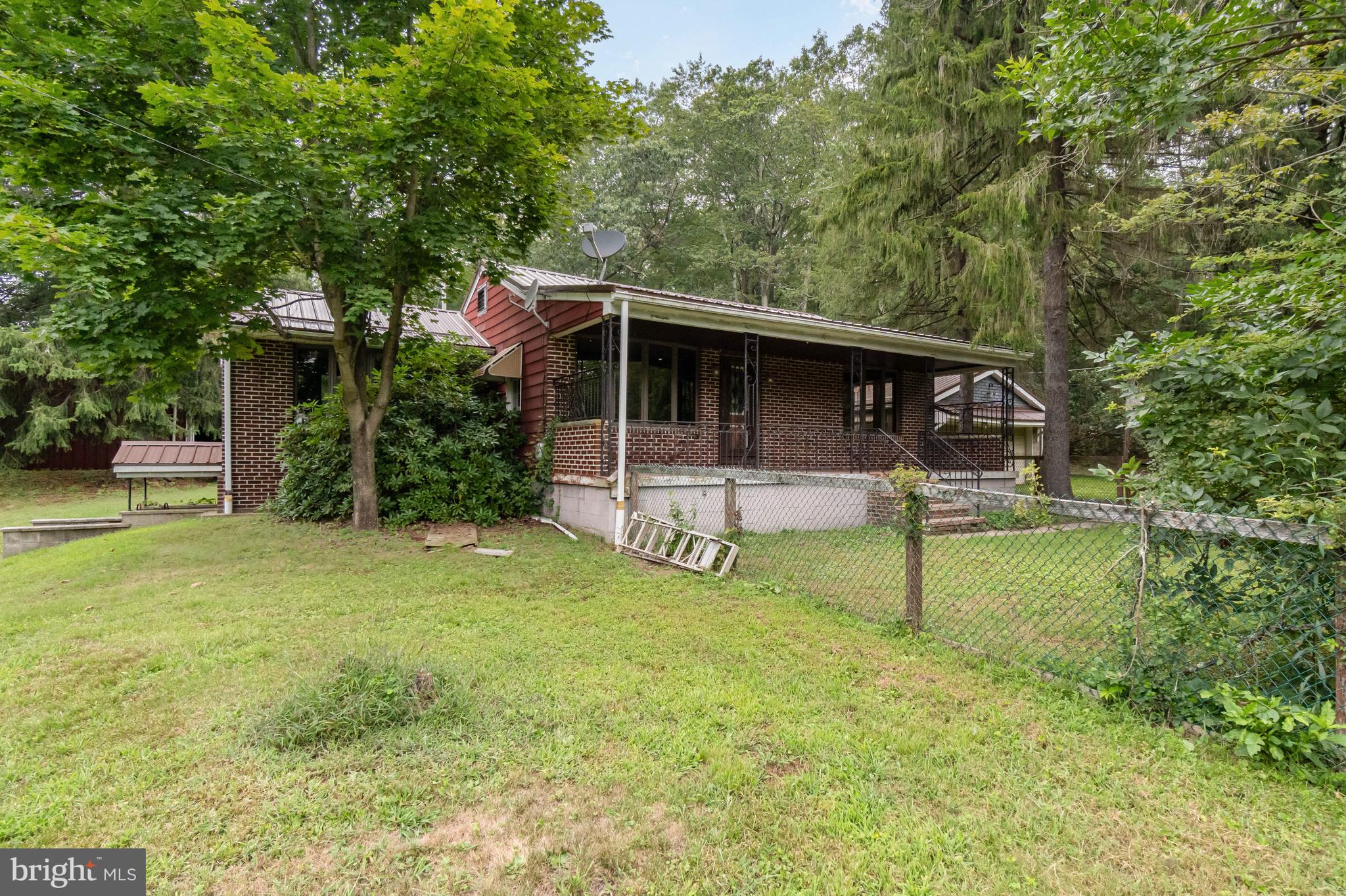 199 State Road Barnesville, PA 18214 - Photo 8 of 56 a front view of a house with garden