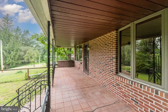 a porch with seating space