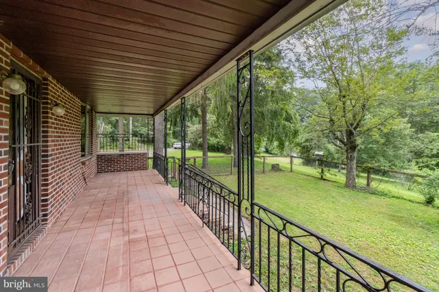 a view of a porch with a backyard