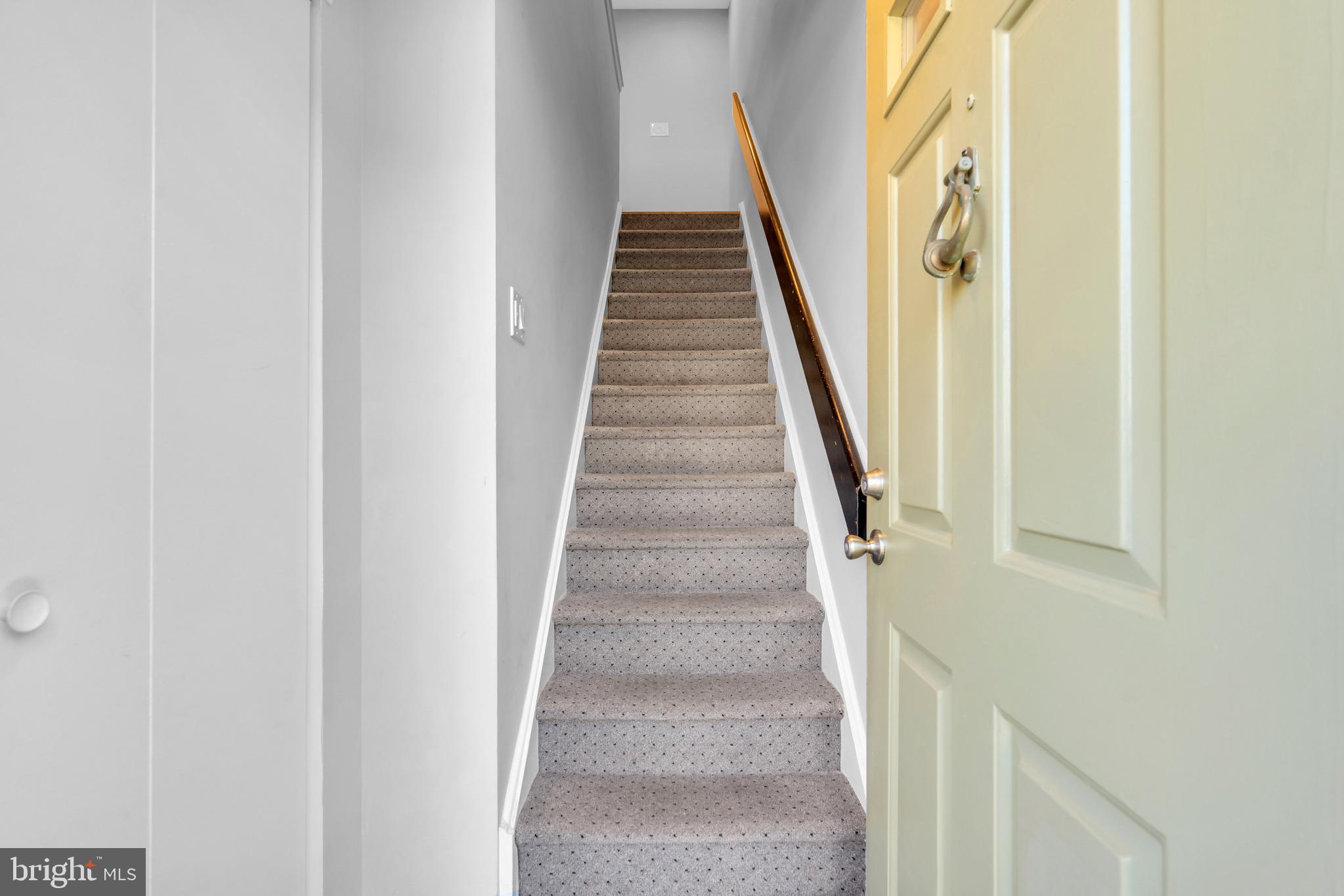 1508 B Ralston Drive Mount Laurel, NJ 08054 - Photo 5 of 29 a view of staircase with wooden floor and white walls
