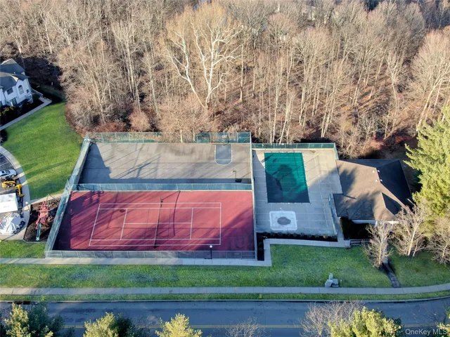 an aerial view of a town with couple of houses