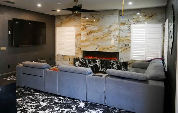 a kitchen with stainless steel appliances granite countertop a sink and a stove