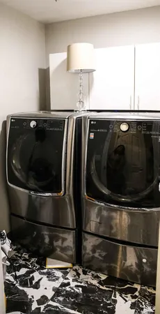 a bedroom with bed and window