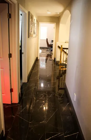 a bathroom with a glass shower door