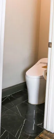 a kitchen with a stove and cabinets