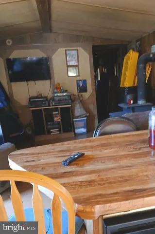 a view of kitchen with wooden floor