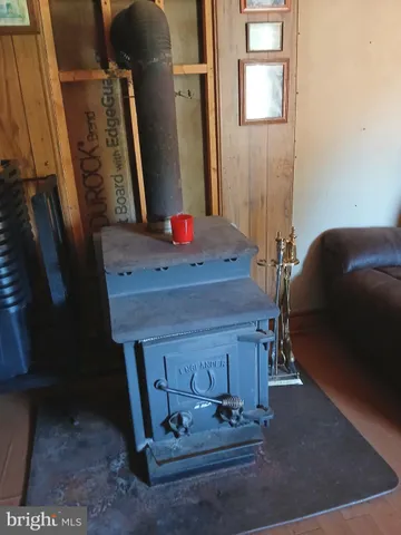 a room with a table and a mirror