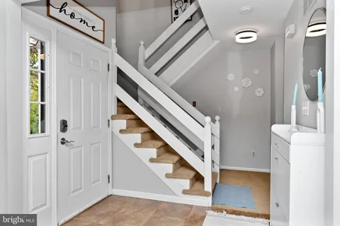 a view of an entryway with staircase