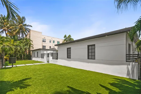 a house view with a garden space