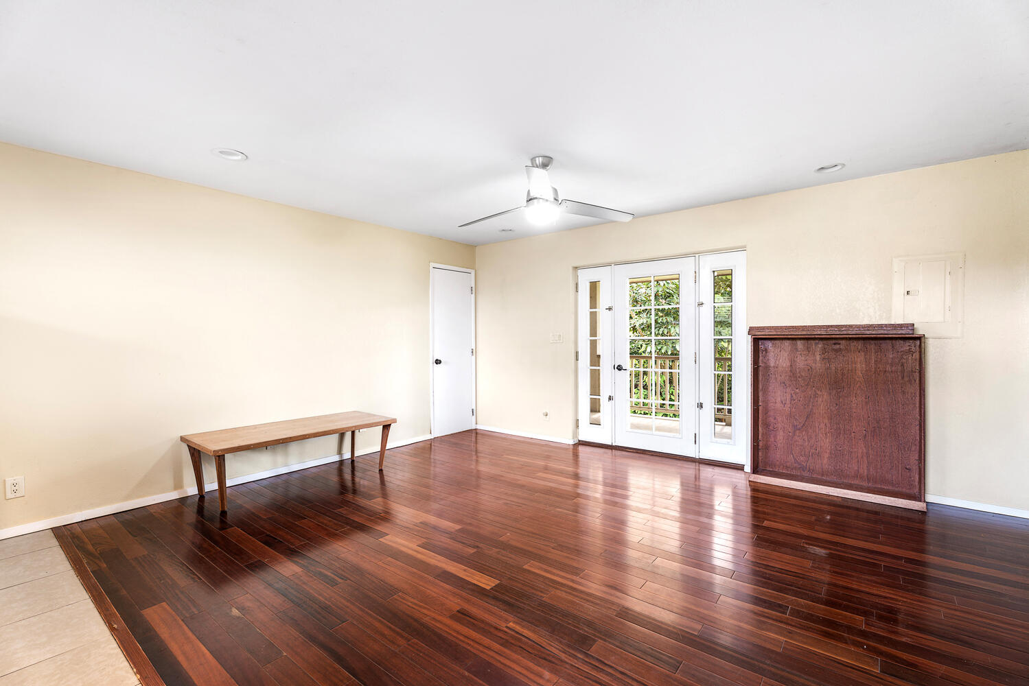 79-1145 Kao Road Holualoa, HI 96725 - Photo 25 of 30 a view of an empty room with wooden floor and a window