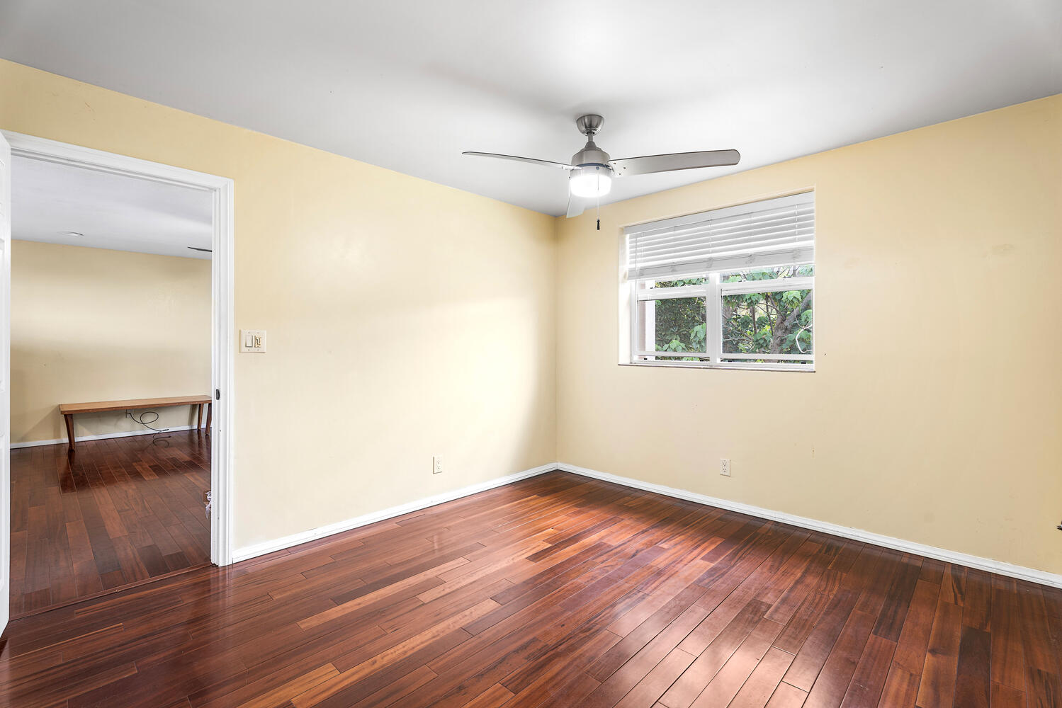 79-1145 Kao Road Holualoa, HI 96725 - Photo 26 of 30 wooden floor in an empty room with a window