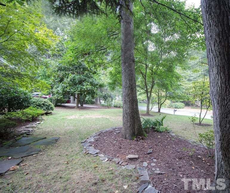 1205 Gunnison Place Raleigh, NC 27609 - Photo 2 of 14 a view of outdoor space and trees