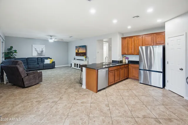 a bathroom with a sink double vanity and a mirror
