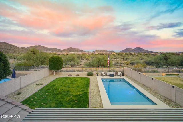 an aerial view of a house with a garden