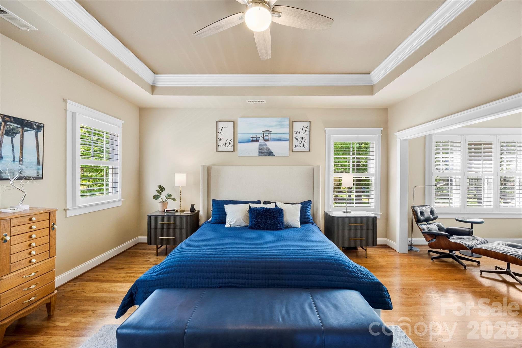 606 Andover Lane Tega Cay, SC 29708 - Photo 20 of 48 a bedroom with a bed and wooden floor