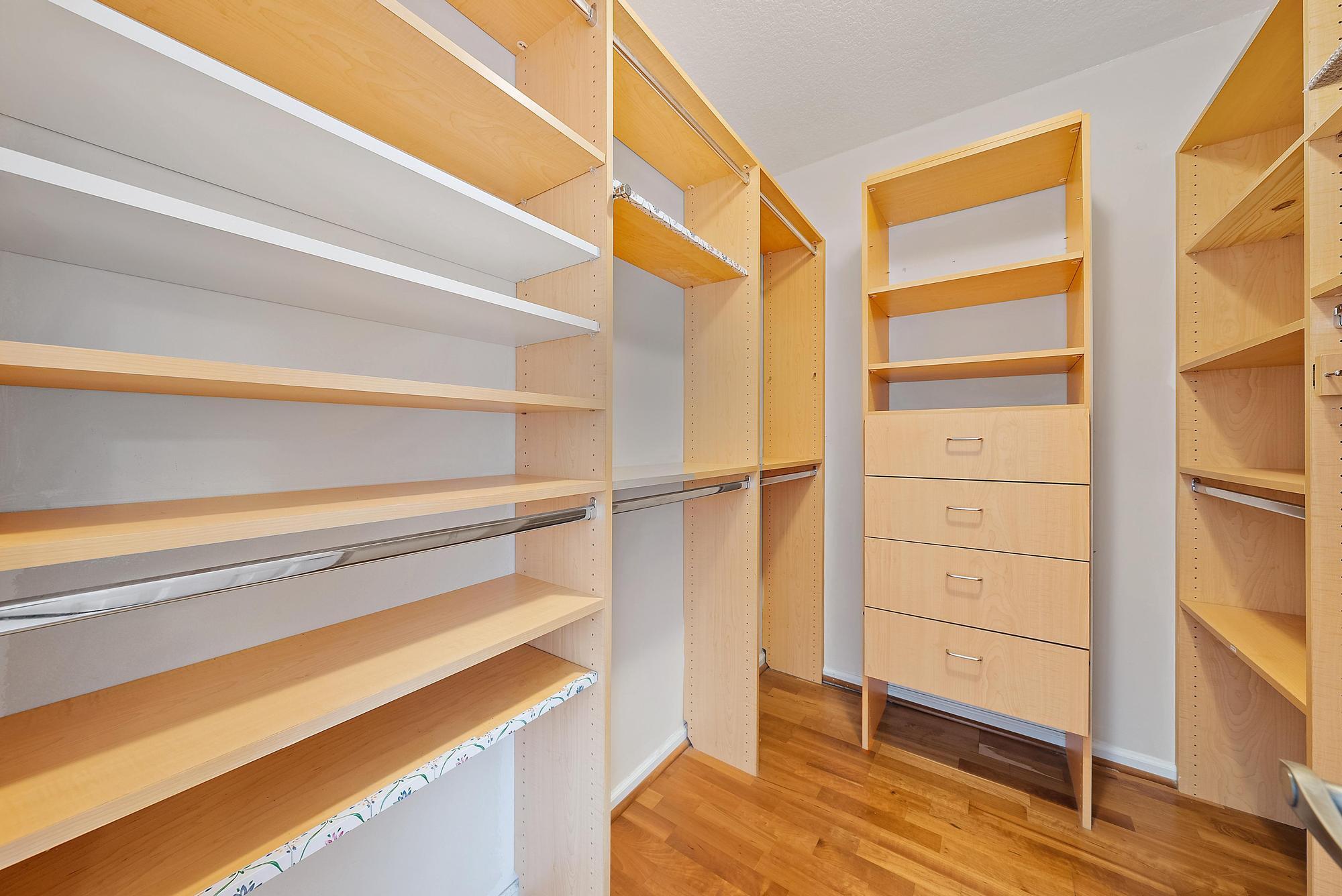356 Golfview Road, Unit 805 North Palm Beach, FL 33408 - Photo 17 of 29 a view of walk in closet with clothes and shoes