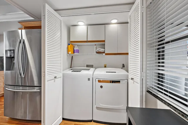 a utility room with dryer and washer