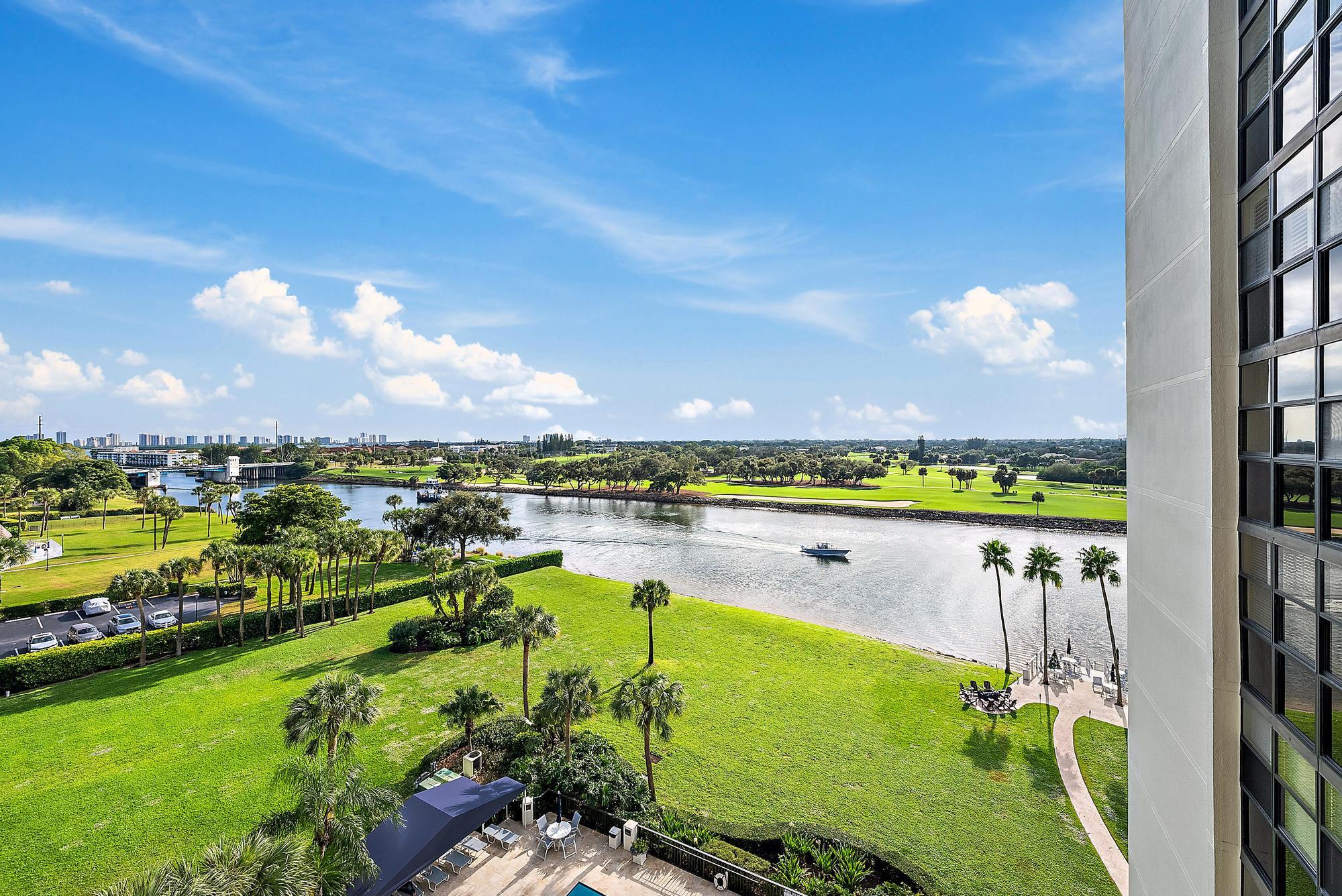 356 Golfview Road, Unit 805 North Palm Beach, FL 33408 - Photo 2 of 29 a view of a lake with a city