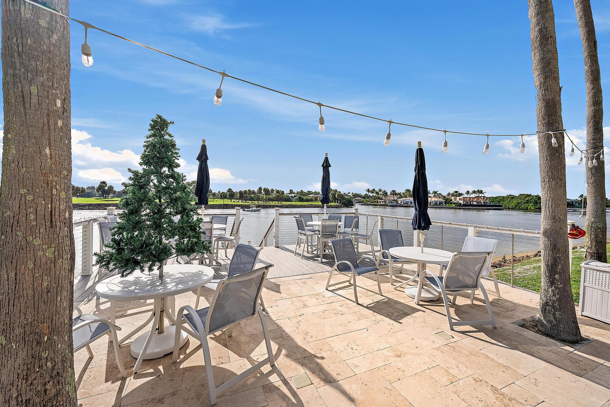 356 Golfview Road, Unit 805 North Palm Beach, FL 33408 - Photo 24 of 29 a view of a terrace with seating area