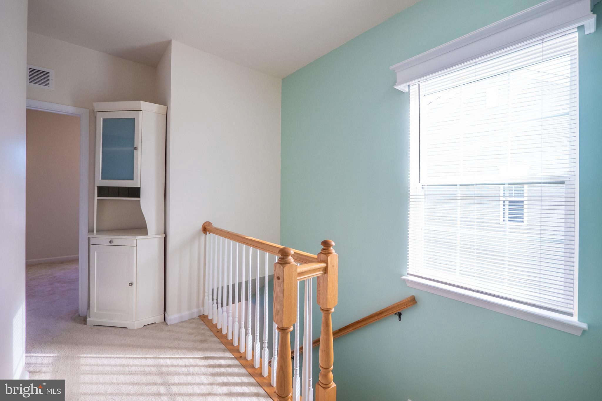 7652 Town View Drive Dundalk, MD 21222 - Photo 14 of 33 a view of a room with wooden floor and windows