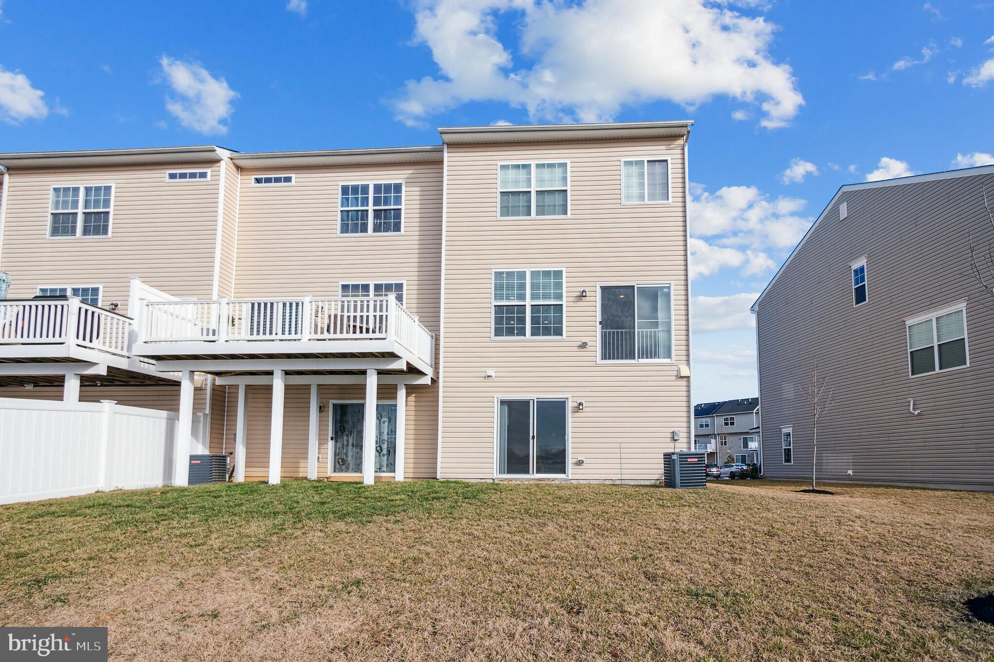 7652 Town View Drive Dundalk, MD 21222 - Photo 32 of 33 a front view of a house with a yard