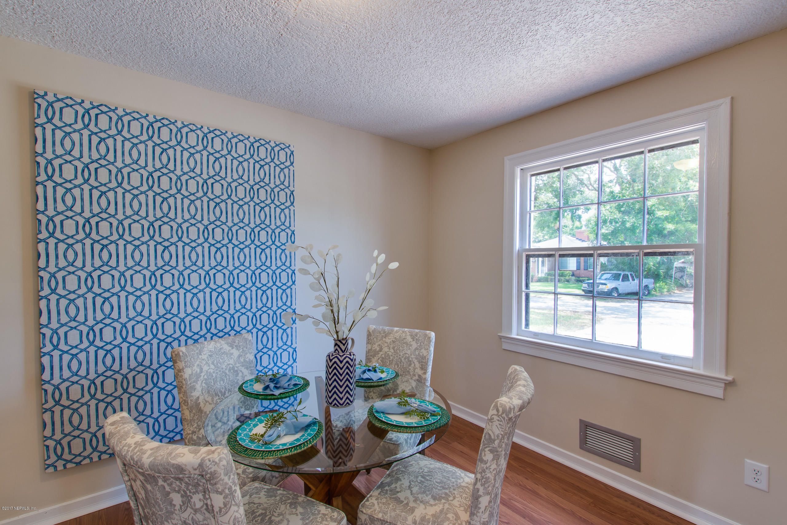 4066 Dover Road Jacksonville, FL 32207 - Photo 18 of 21 a living room with furniture and a window