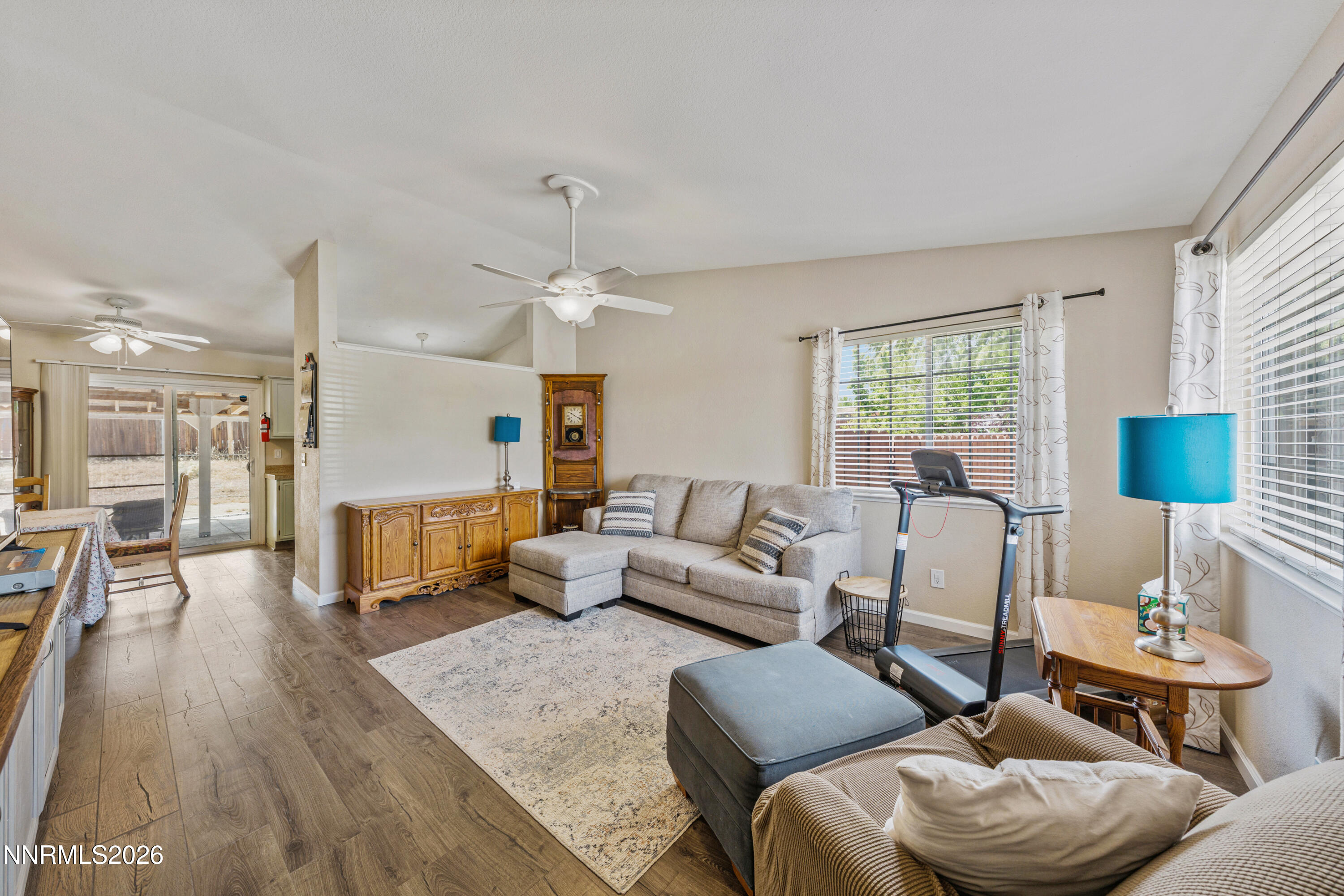 6370 Mono Court Sun Valley, NV 89433 - Photo 2 of 22 a living room with furniture and a wooden floor