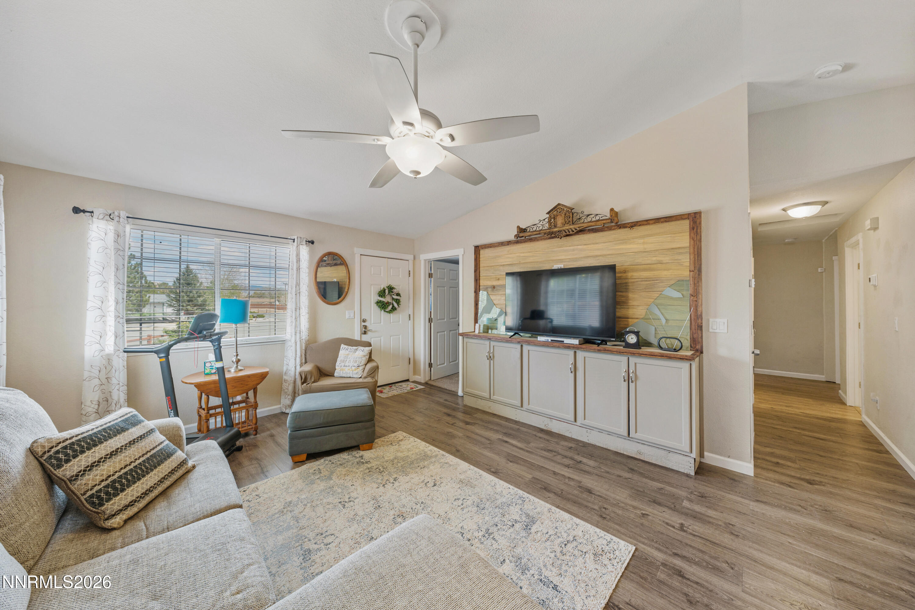 6370 Mono Court Sun Valley, NV 89433 - Photo 3 of 22 a living room with furniture and a flat screen tv