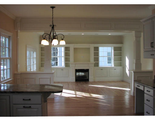 12 Hickory Road Wellesley, MA 02482 - Photo 8 of 17 a kitchen with kitchen island granite countertop a stove a sink and a wooden floors