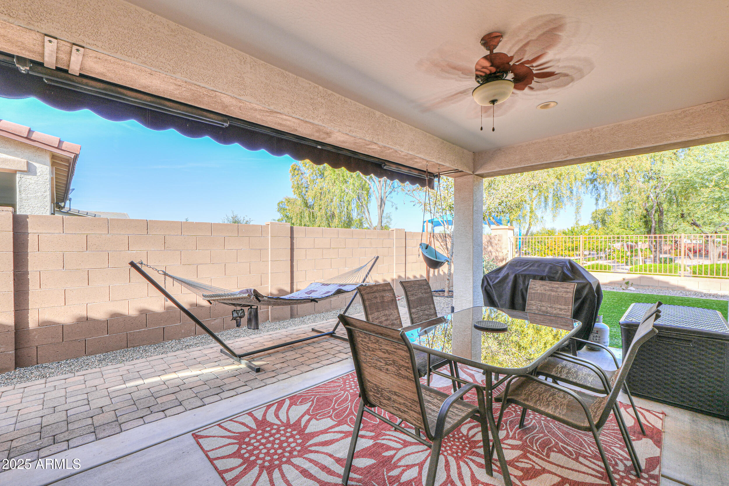 44202 West Palo Olmo Road Maricopa, AZ 85138 - Photo 23 of 32 a view of a dining room with furniture window and outside view