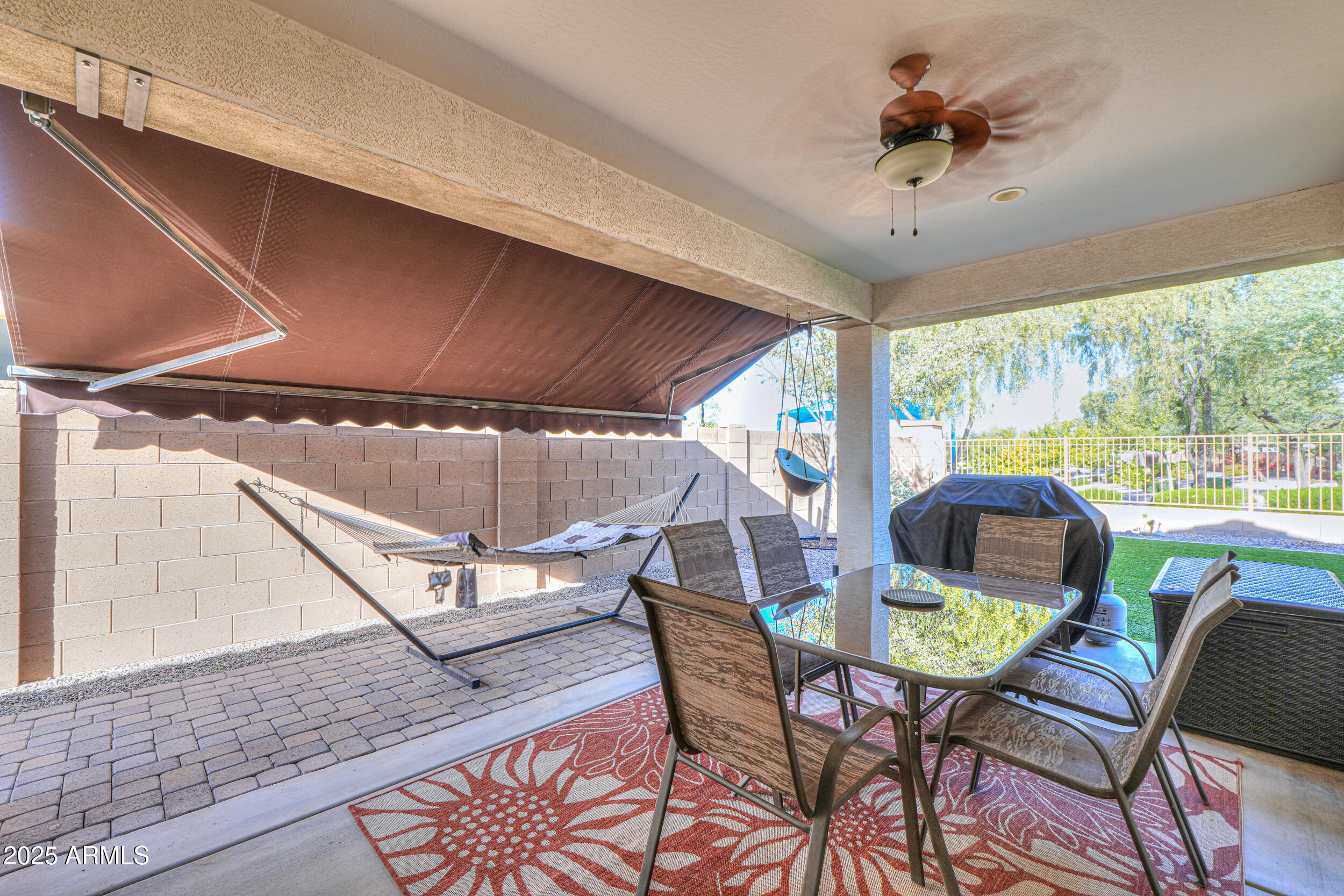44202 West Palo Olmo Road Maricopa, AZ 85138 - Photo 24 of 32 a view of a dining room with furniture window and outside view